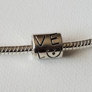 Charm. NWOT.  Fits in Pandora snake chain Bracelet